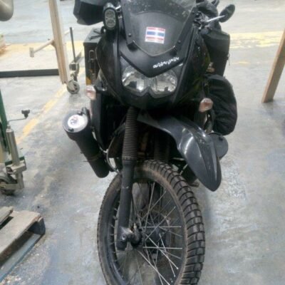 Adventure motorbike before crating, front view