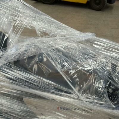 Close-up of plastic wrap over motorbike parts