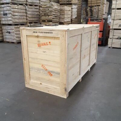 Closed wooden crate marked fragile and keep dry