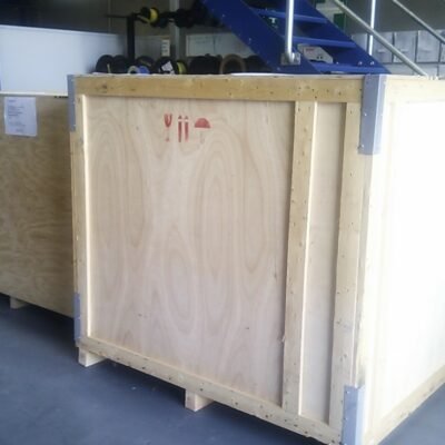Closed plywood crate with reinforced metal corners