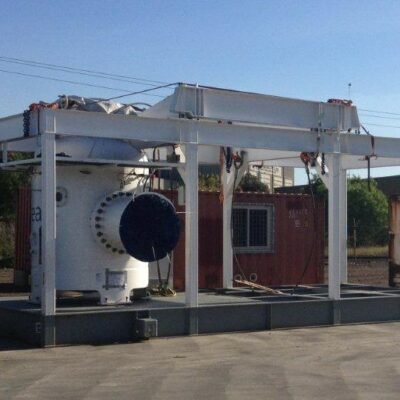 Industrial vessel mounted in a steel support frame